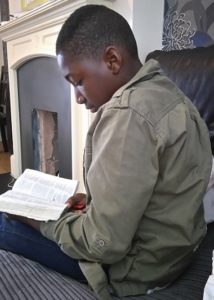 Boy doing Bible Study